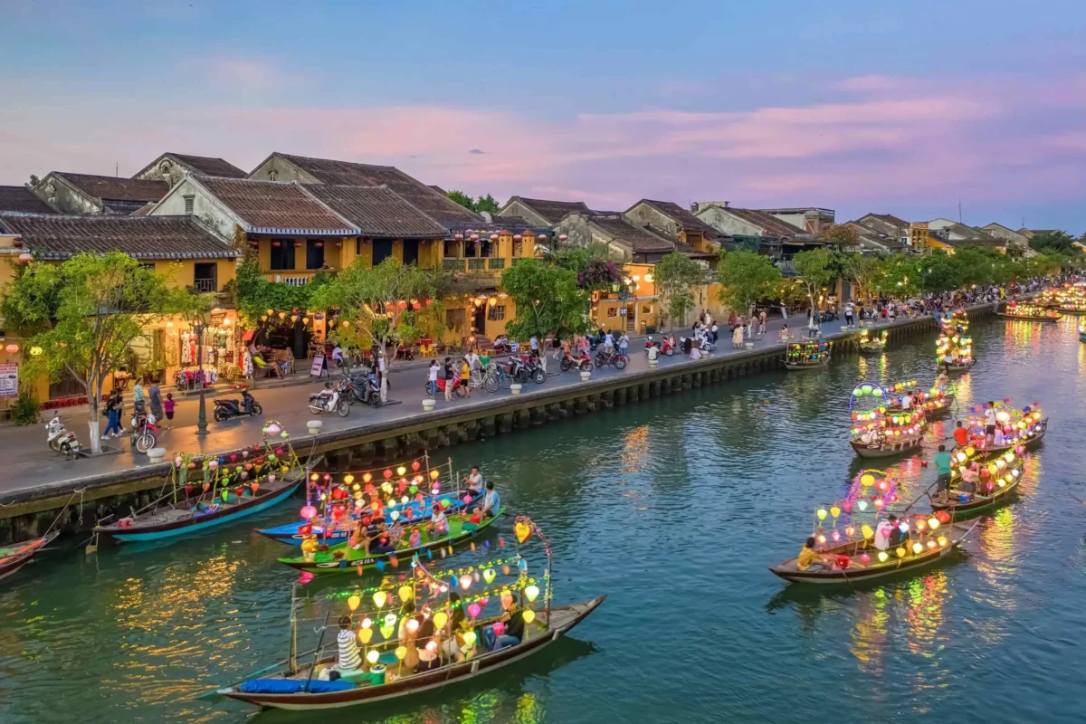 Lantern boats lighting up the river at Hoi An Old Town